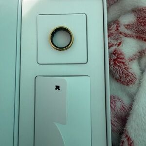 Gold Ultrahuman Ring.